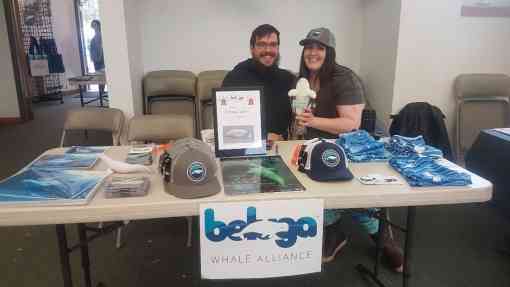 Beluga whale alliance volunteers manning the booth 