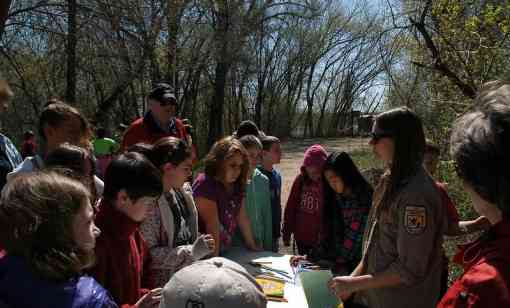 Minnesota Valley National Wildlife Refuge Intern Katie Laughlin talks with the students about creating a nature journal for the day