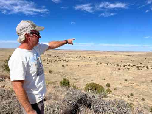 Reserve manager Jay Tutchton points to the newly acquired acres of the Heartland Ranch Nature Preserve.