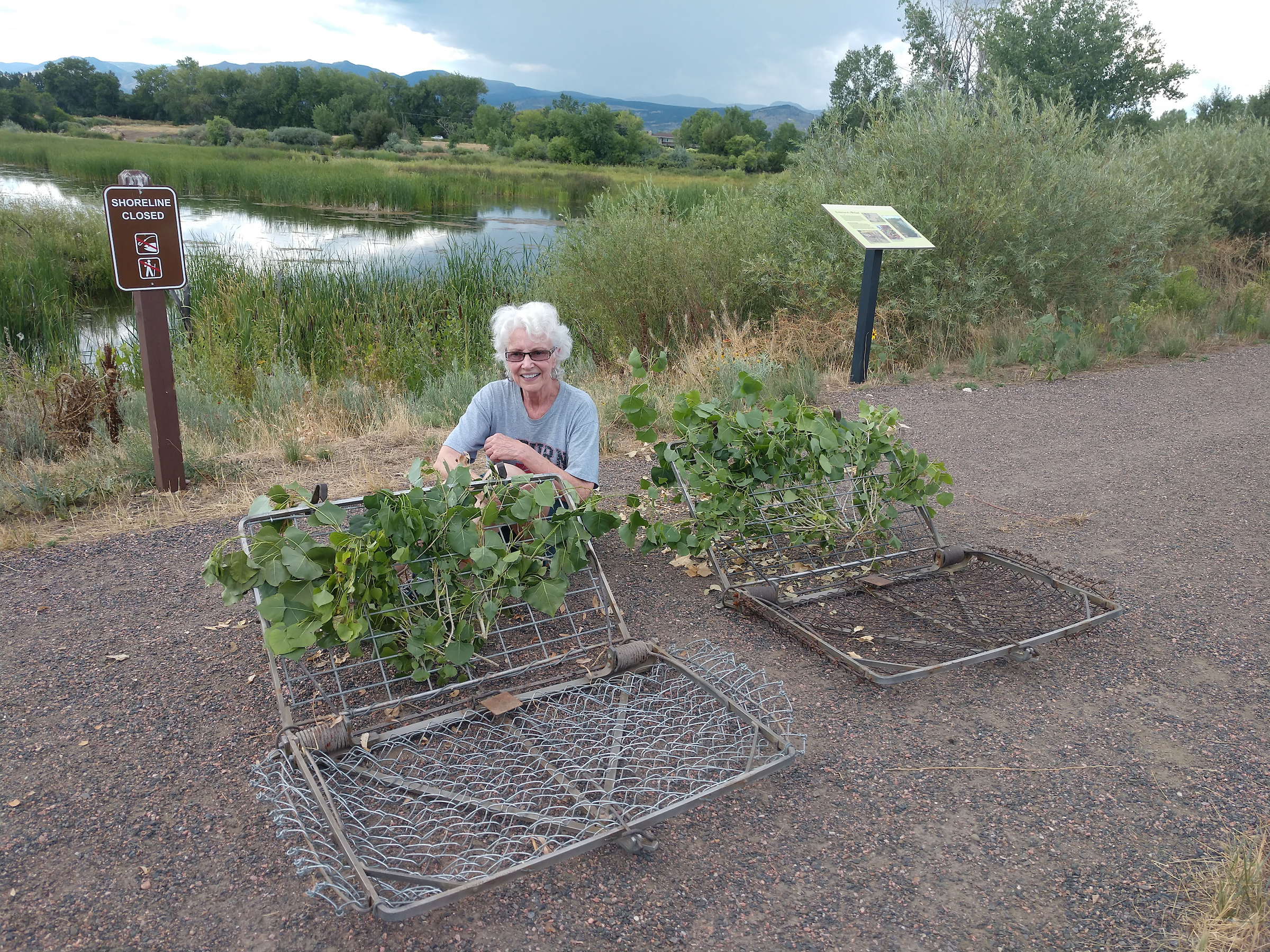 Woman sitting next to beaver trap