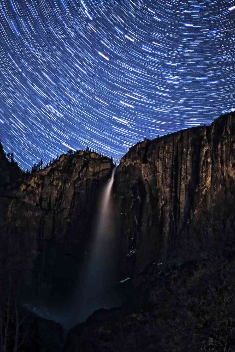 Star trails Upper Falls Yosemite National Park CA