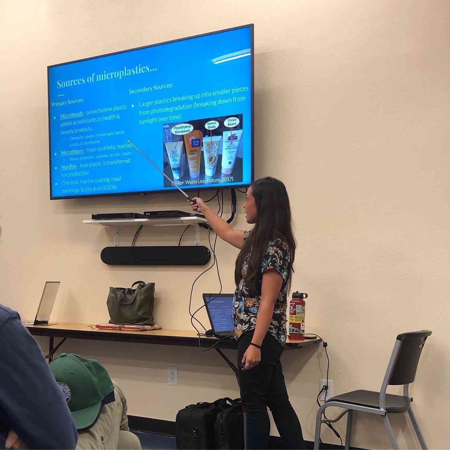 Cristina giving a presentation
